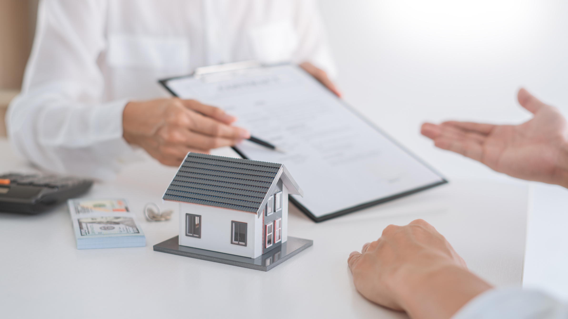 Real Estate Agent Explain Contract to Homebuyer